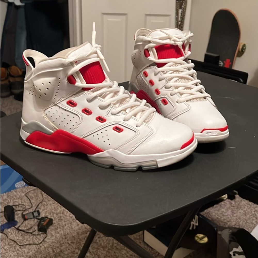 Men’s white and fire red Jordan’s